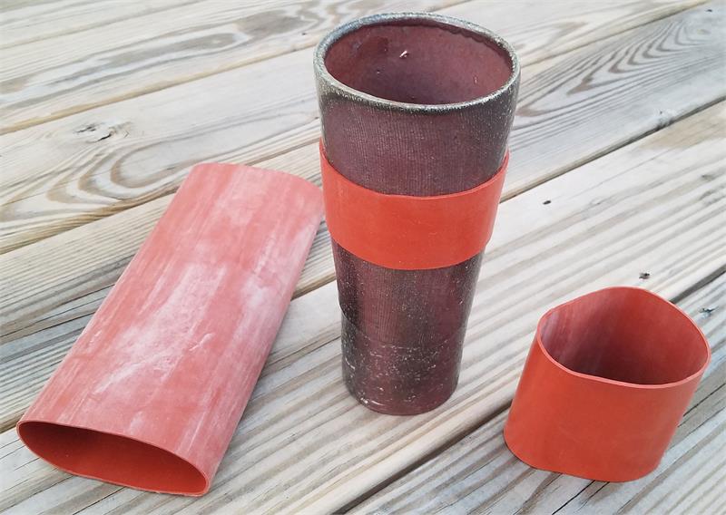 Red silicone sleeve material for tumblers